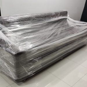 Sofa packed with bubble wrap for local shifting in JP Nagar